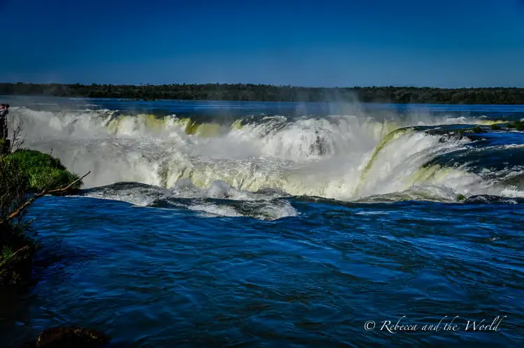 The tumultuous water at the Garganta del Diable (Devil's Throat) at Iguazu Falls, captured from a close vantage point, highlighting the raw power of the moving water.