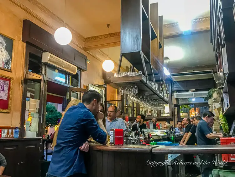 Looking for the best tapas in Seville? We spent our time in Seville eating all the tapas and I have some great recommendations! Here are 7 of the must-visit tapas bars in Seville, both traditional and modern. #seville #spain #andalucia #tapas #spanishfood #foodie #weekendtrip #foodietravels