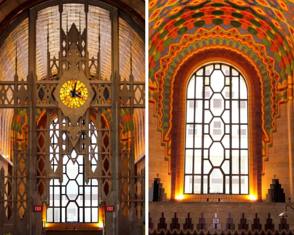 Interior of the Guardian Building in Detroit showcasing ornate Art Deco design, with a large clock and colourful tile work.