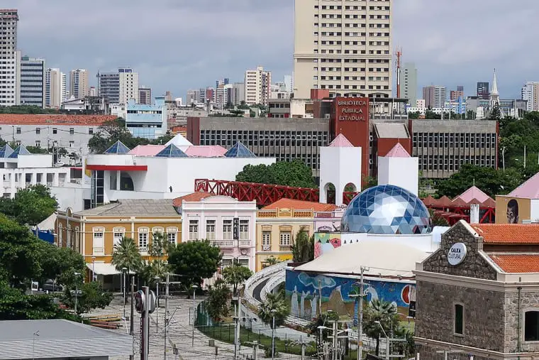 View of the Fortaleza cityscape, showing a blend of modern high-rises and historic architecture. Find perfect beaches and Brazilian culture in Fortaleza, Brazil