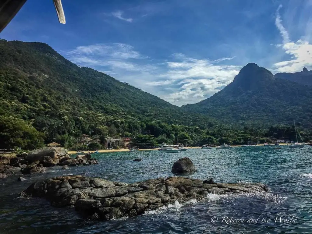 The first view of Ilha Grande, Brazil: lush green mountains 