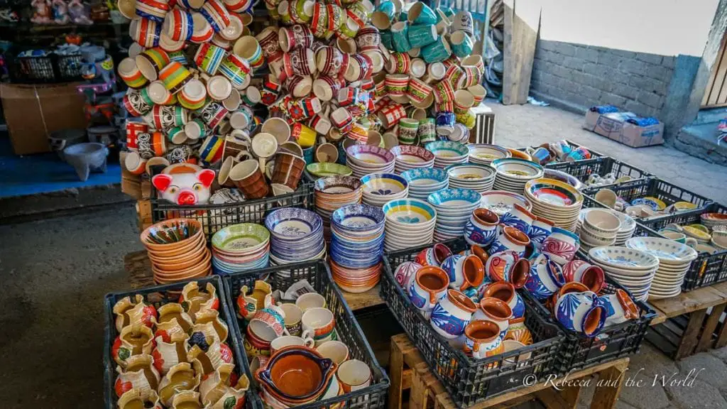 Vibrant display of traditional Oaxacan ceramics and pottery in a local market. There are so many gorgeous things to buy when traveling to Oaxaca - from pottery to hand-stitched blouses, to chocolate and rugs, you'll find amazing souvenirs to take home.