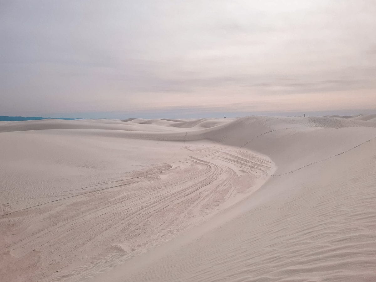 White Sands National Park is one of the more unique places to visit in the US - here you can go sand boarding on the dunes!