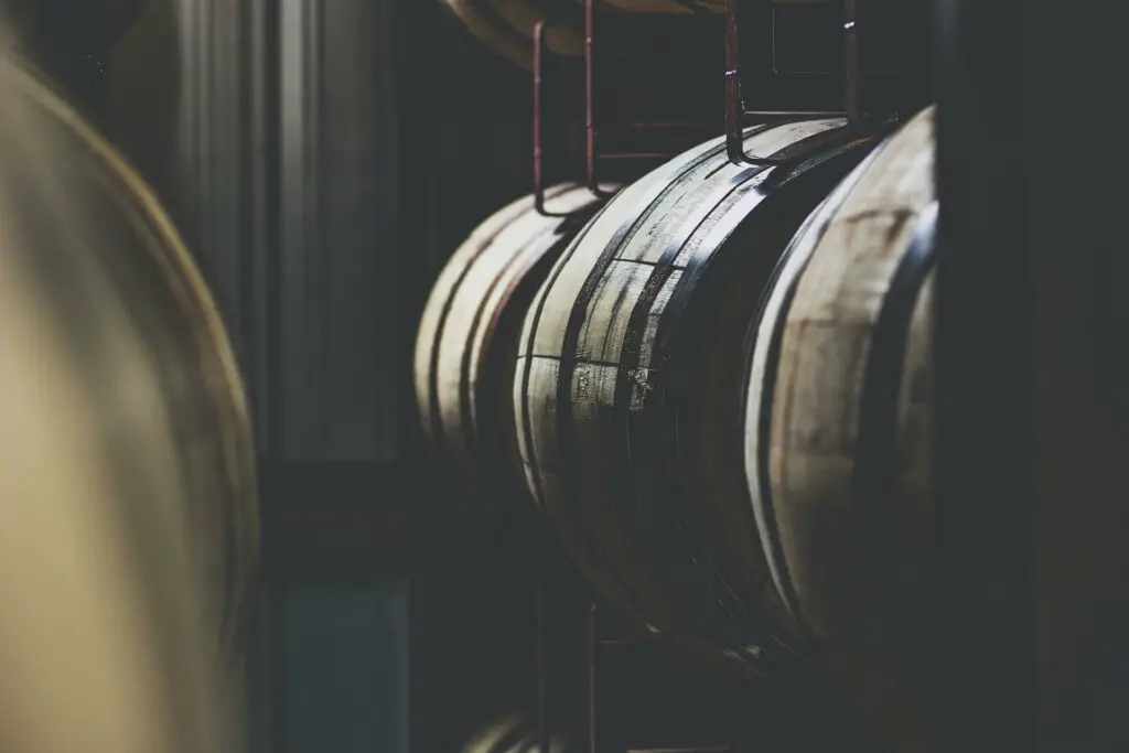 Bourbon barrels in a dark cellar