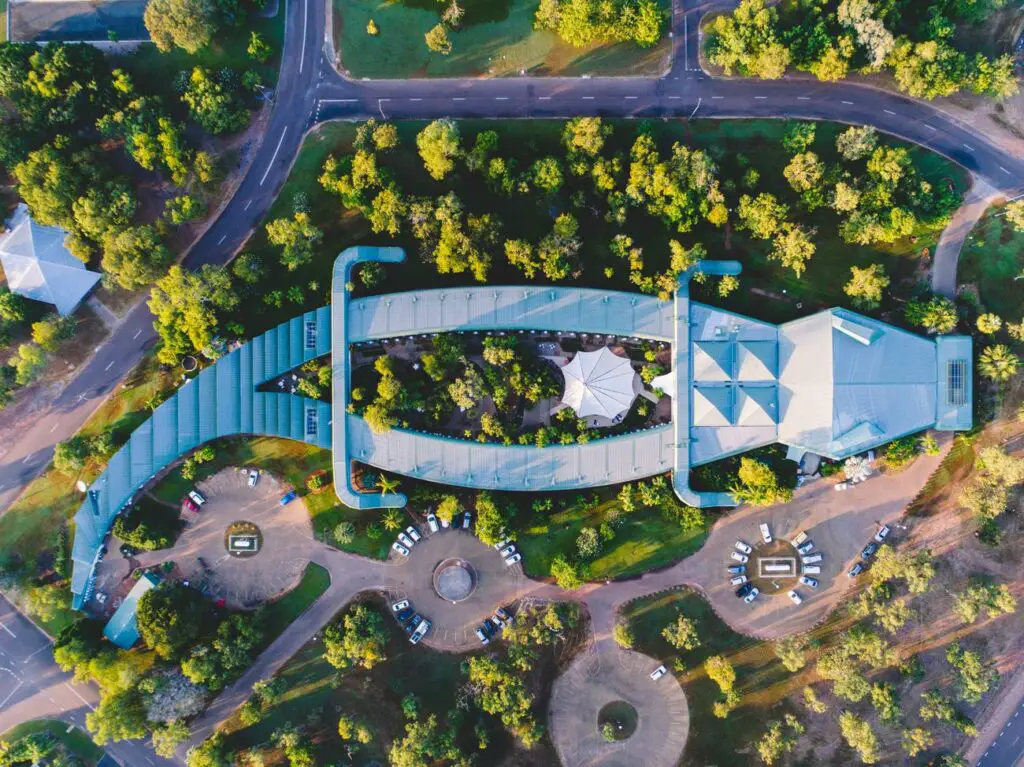 An overhead shot of the Mercure Kakadu Crocodile Hotel in Kakadu National Park, with its uniquely designed building in the shape of a crocodile.