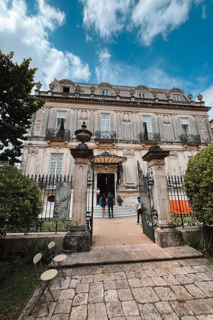 Historic mansion entrance on Paseo de Montejo, showcasing the opulence of Merida’s past and a highlight of Yucatan travel.