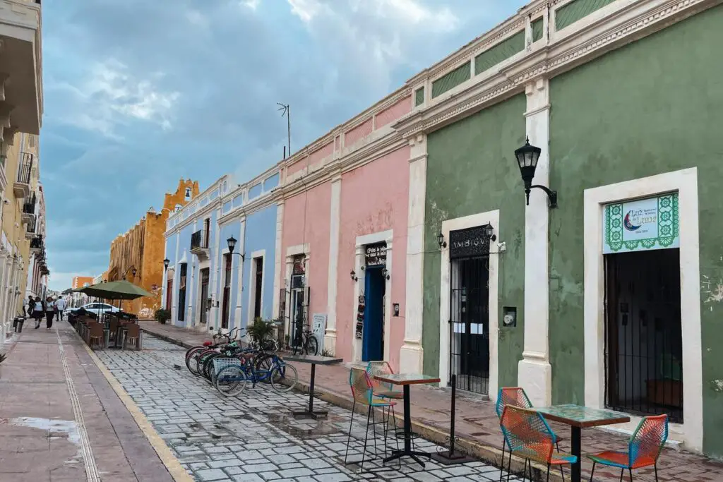 Pastel-colored colonial buildings along a quiet street in Campeche, a charming UNESCO-listed city in the Yucatan Peninsula.
