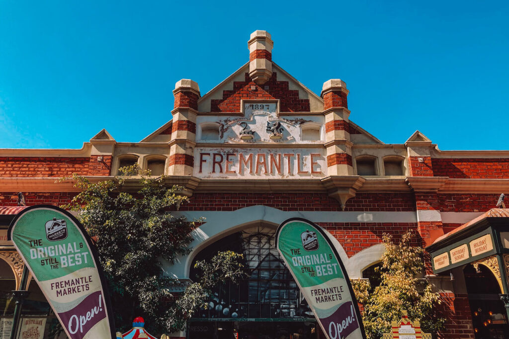 The historic Fremantle Markets building under blue skies, a great spot for food lovers exploring Perth and Fremantle on a 2-week Australia itinerary.