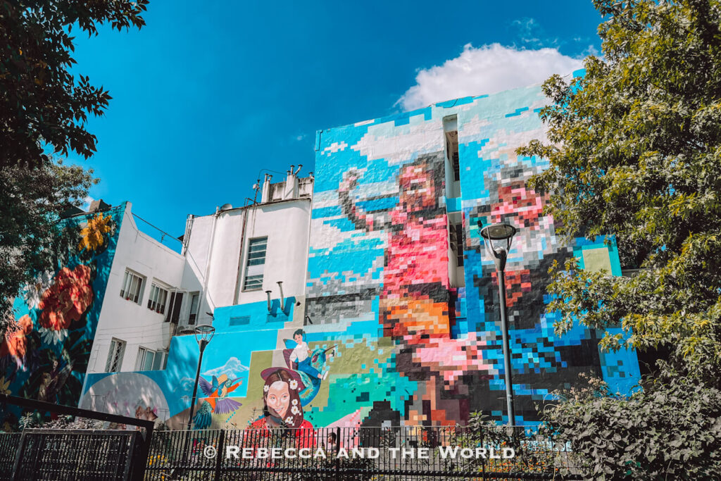 Vibrant street art covering a building facade in Buenos Aires, part of the Palermo Viejo neighbourhood explored around this asado tour in Buenos Aires.