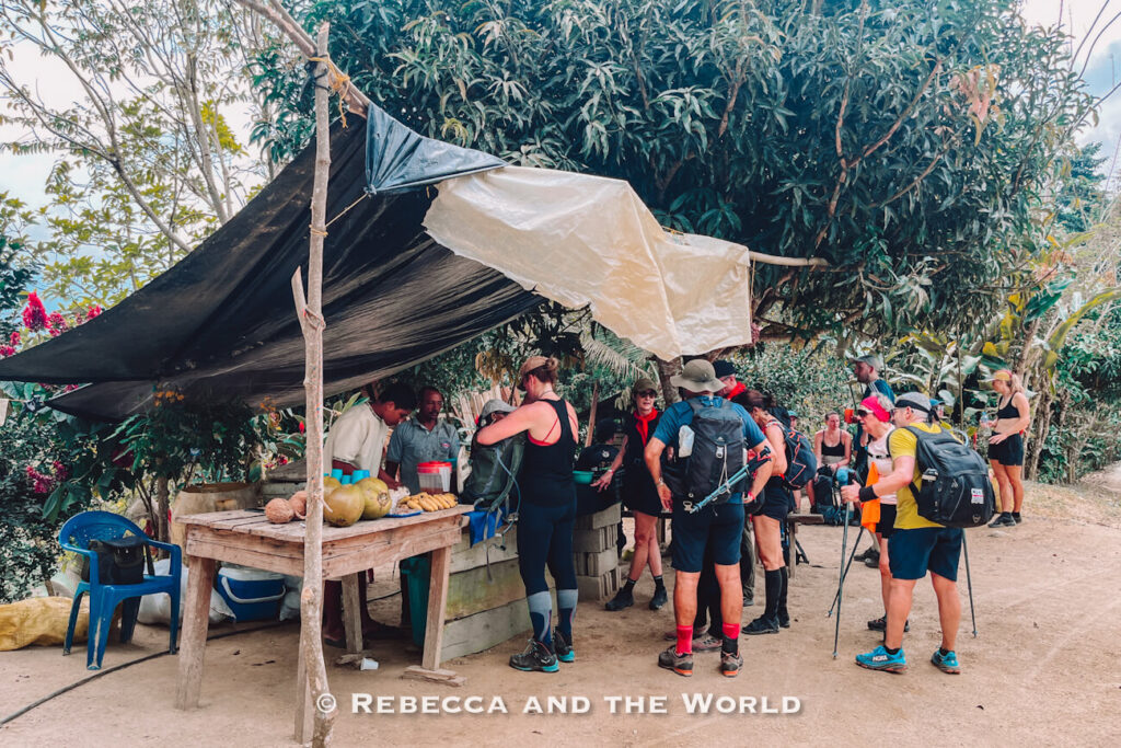 Hikers gathered at a small roadside fruit stand during a rest stop on the Lost City trek through the Sierra Nevada mountains.