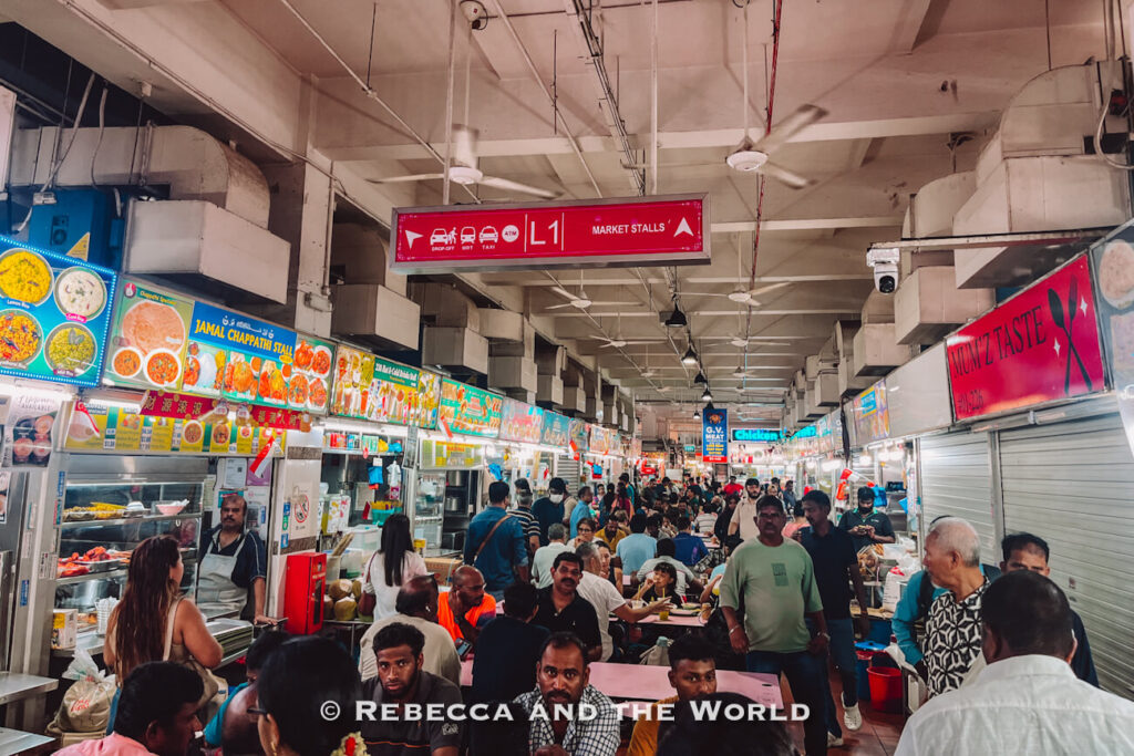 A busy hawker centre in Little India, Singapore, packed with food stalls and diners during the chef's tour