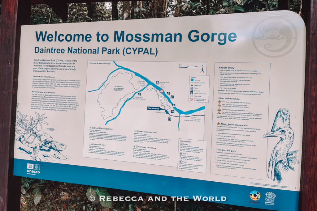 The "Welcome to Mossman Gorge" information sign at the shuttle stop, showing a map of the Mossman Gorge walks, track grades and swimming safety warnings