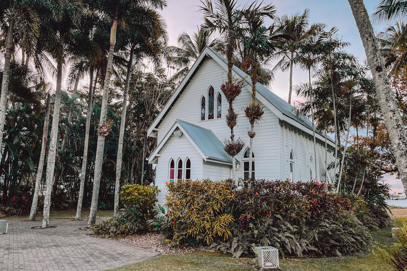 St Mary's by the Sea, the historic white chapel surrounded by palm trees, a popular photo spot and wedding venue in Port Douglas